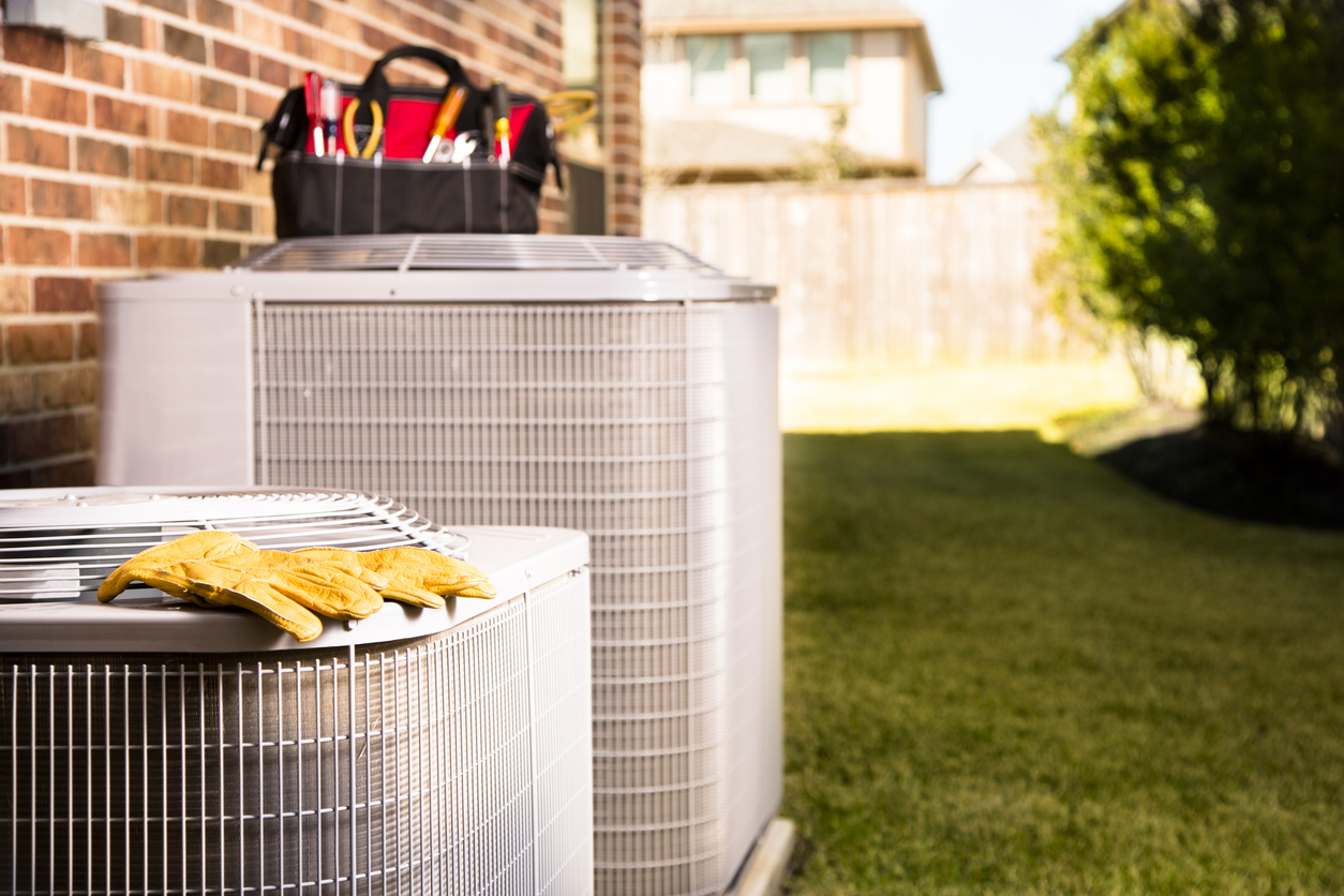 Work Gloves and Tools on AC Unit