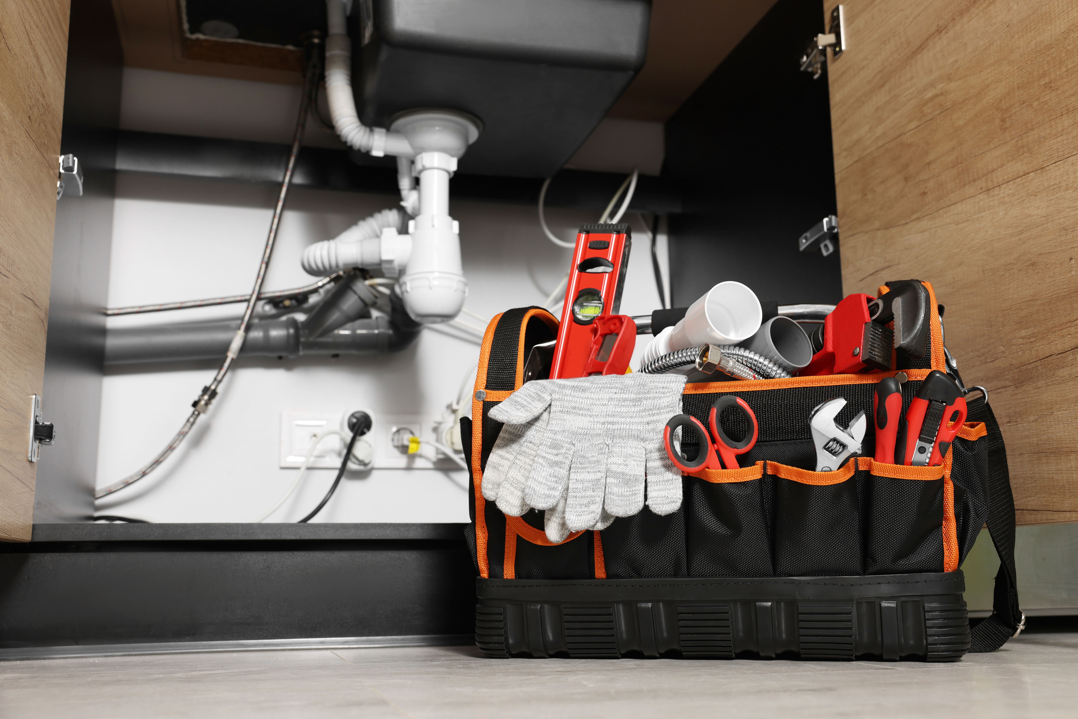 Plumber Bag Near Kitchen Sink