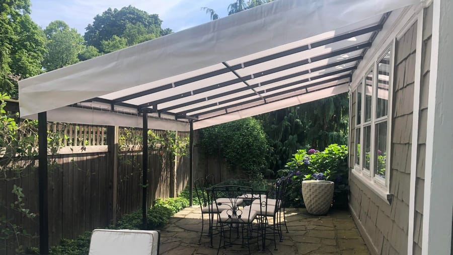 exterior awning outside of a home providing shade