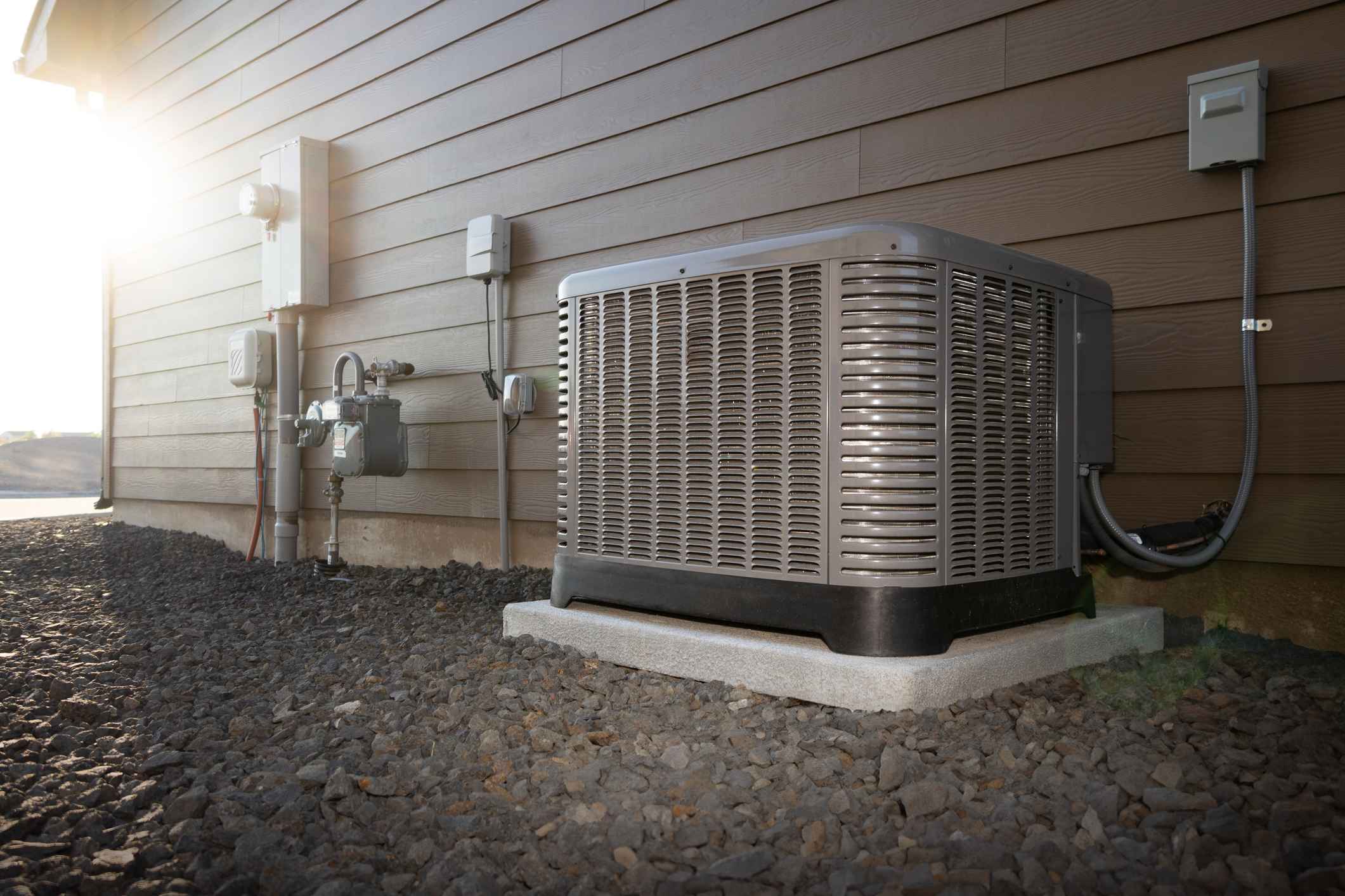 Outdoor air conditioning unit on concrete slab